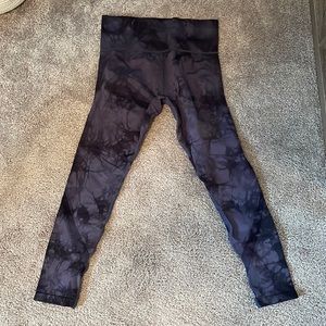 SoulCycle skull and crossbone black and purple leggings